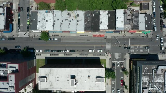 flying right reveal of BLM sign on Fulton St. in Bed Stuy Brooklyn