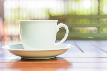 a cup of coffee on table