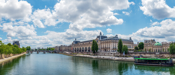 Panoramic of Musee d'Orsay, Hotel de Salm and Seine river with Notre Dame and Institut de France in the Background - Paris, France - obrazy, fototapety, plakaty