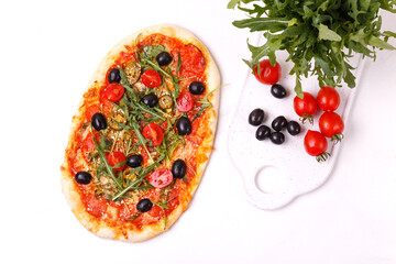 Italian pepperoni pizza pinza with olives and arugula