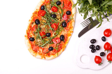 Italian pepperoni pizza pinza with olives and arugula
