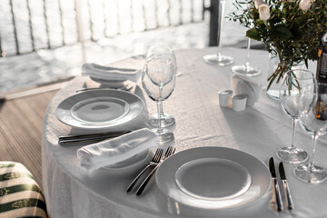Fancy table set for a wedding romantic dinner in restaurant