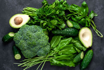 Set of raw healthy food for vegetarians: on a stone background