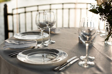 Fancy table set for a wedding romantic dinner in restaurant