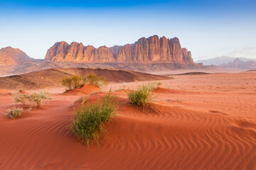 Wadi Rum Desert, Jordan. The red desert and Jabal Al Qattar mountain. - obrazy, fototapety, plakaty