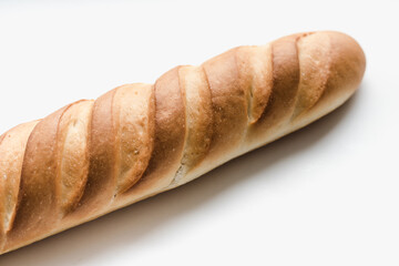 baguette on a white background, sliced ​​long loaf, sliced ​​long loaf on a white background, bakery products