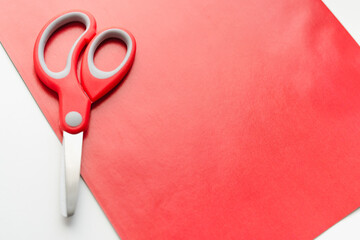red handle stationery scissors, scissors on a white background