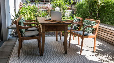 Laptop workstation on a patio