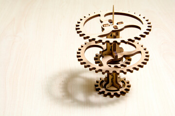 Wooden gear. The photo . Environmental progress concept