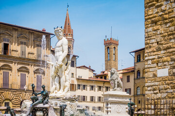 Piazza della Signoria and Fountain of Neptune in Florence. Piazza della Signoria is the square in...