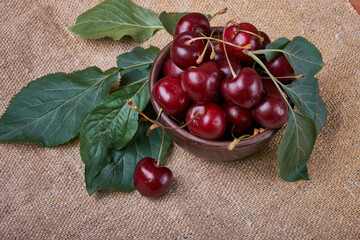 Fresh cherries in a bowl on the table