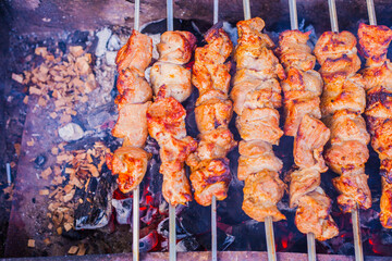 Shish kebab on the grill with coals.