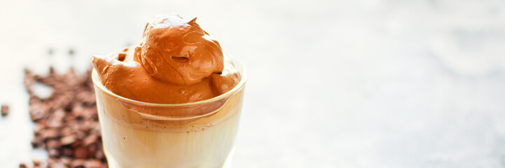 Dalgona coffee ice drink
cappuccino or latte fluffy creamy whipped  food background top view copy space