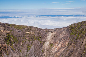 Fototapeta na wymiar View from Irazu volcano on mountains and clouds - Costa Rica