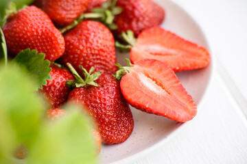 Beautiful juicy fresh strawberries on the concrete surface of the table