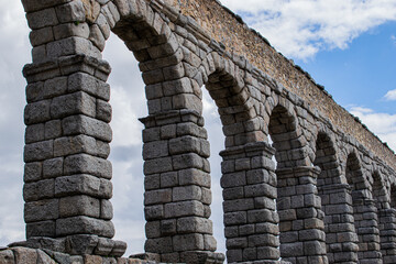 Photo of Segovia aqueduct in Spain during a sunny day
