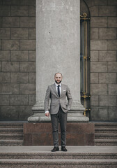 Elegant handsome man in full suit