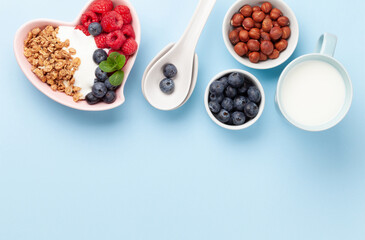 Healthy breakfast with granola, yogurt and berries