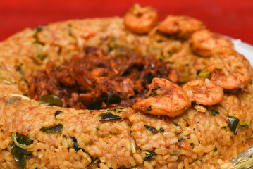Biryani with shrimp Fish Biryani. Tasty and delicious prawns biryani, top view in traditional clay pot.