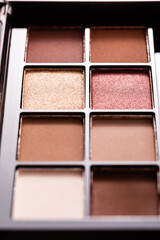 selective focus of colorful pastel eye shadow palette