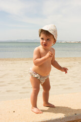baby alone in the beach