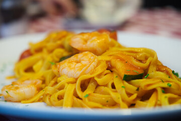 Delicious homemade Italian pasta with shrimps and parmesan cheese