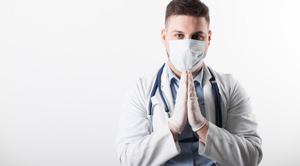 European doctor pray for world. Coronavirus epidemic quarantine