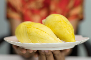  Asian women holding durian ripe