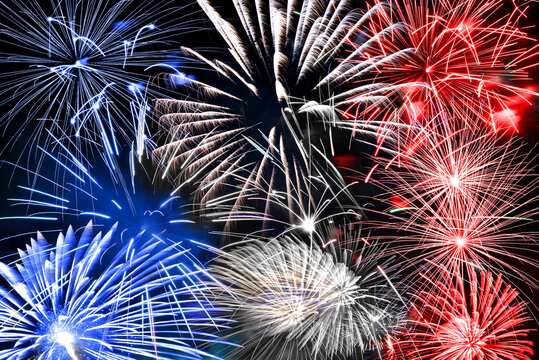 Blue white and red fireworks panoramic background, US 4th of July or France July 14 national day party concept