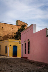 Empty cobblestone street and quaint Spanish style colonial architecture in the residential neighbourhood of the city centre, Trinidad, Cuba