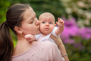 Mother and her child enjoy the early spring in public park in Czech republic