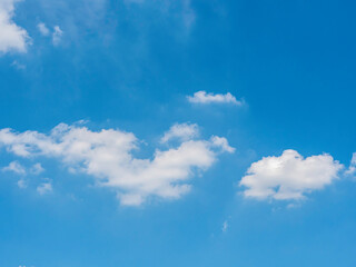The sky is bright with the blue sky and a beautiful heart shaped cloud can be seen in the background.