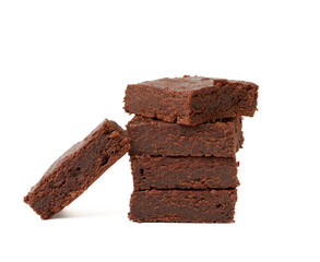 stack of square baked pieces of brownie chocolate cake isolated on a white background, delicious dessert