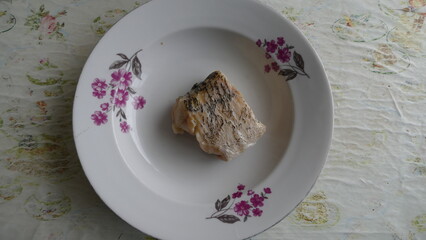 boiled fish pike on a platter