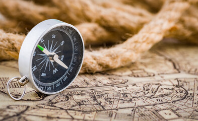Fototapeta na wymiar compass on the world map