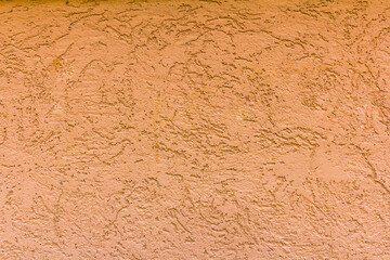 The texture of an iron sheet painted with paint that is subject to corrosion. External part of the object.