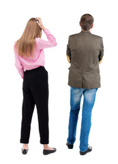 Back view of  business woman and business man in suit.