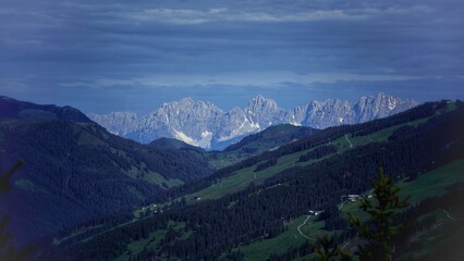 cloudy and sunny morning on the mountains in spring with view to the alps in austria