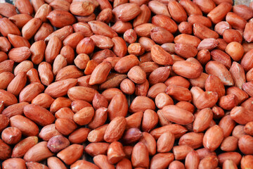 Peeled peanuts closeup, top view. Background of peanuts. Snack
