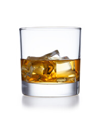 A isolated tumbler style glass of whisky and ice, shot on white