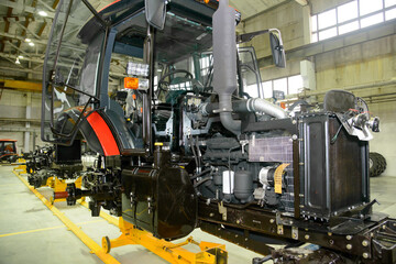 tractor Assembly on the conveyor, engine, spare parts