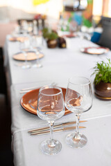 Stylish table setting in an open-air restaurant.