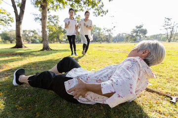 Senior woman is holding her hip,severe pain in her muscle,broken bone,injury to the waist,old...