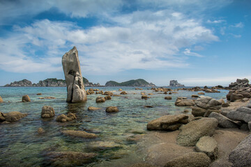 Fototapeta premium Large stones in the sea with a transparent bottom