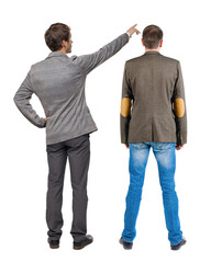 Back view of business man and business woman in suit pointing.