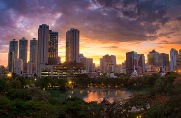 Fototapeta na wymiar Beautiful sunset behind business town in Bangkok