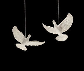 Each turtle dove is intricately sculptured from an artisan with resin material to look realistic...