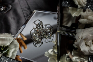 decorative diamonds on the table. wedding decoration. mirror and flowers