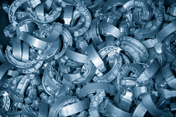 The pile of aluminium casting parts of drum brake. The automotive parts manufacturing process by...