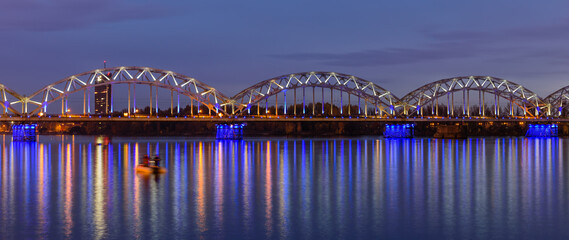 Fototapeta premium Bridge over Daugava river, beautiful night view, Riga, Latvia